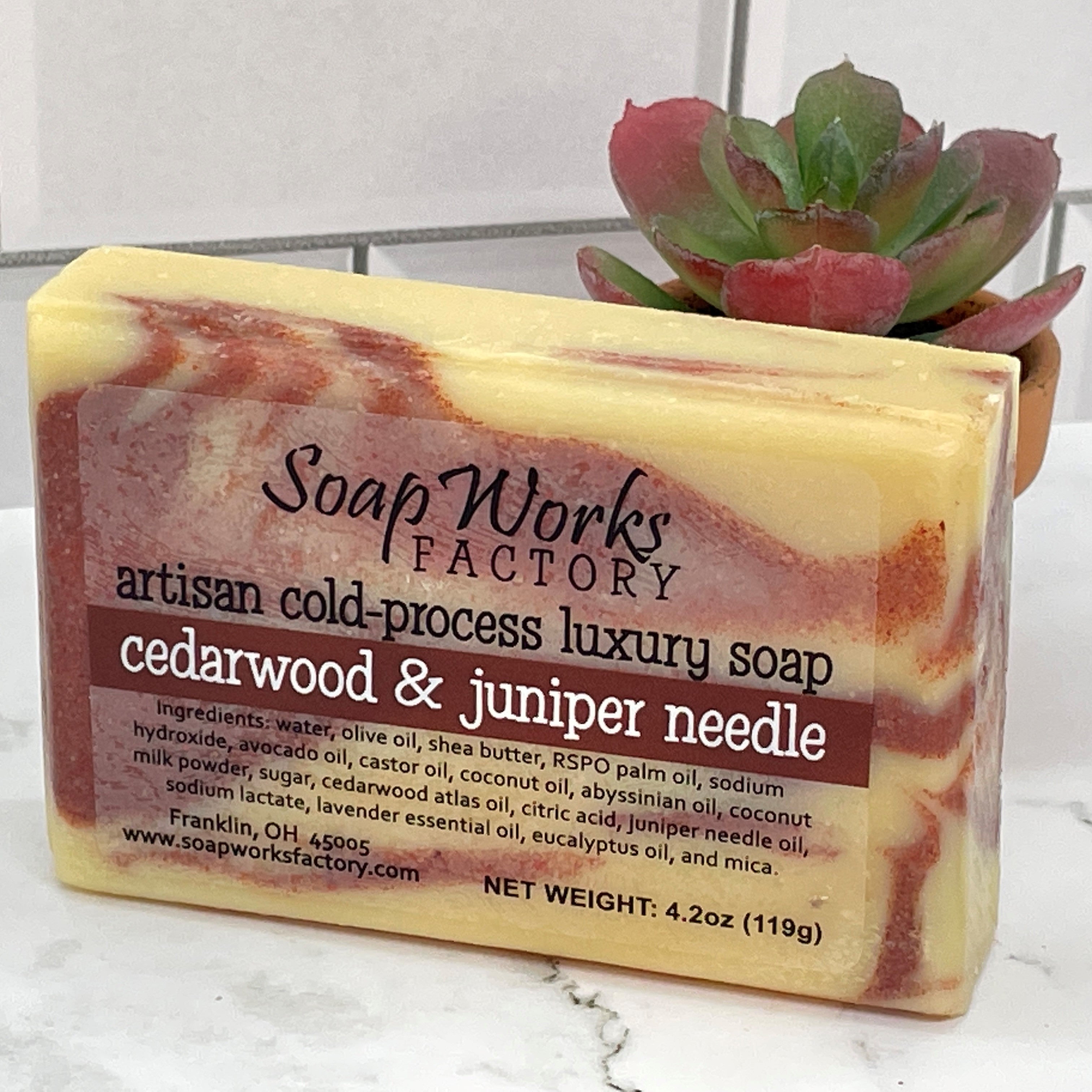 http://www.soapworksfactory.com/cdn/shop/products/cedarwoodandjuniperberrysoap2.jpg?v=1681571655